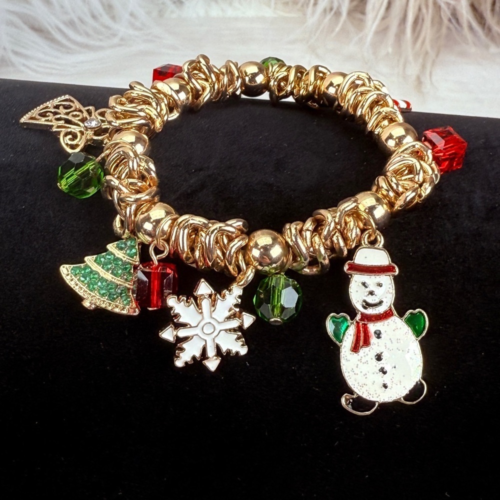 Goldtone, holiday Christmas charm stretch bracelet